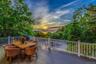 Deck with gorgeous sunset and water views