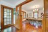 Living Room into Dining Room with Door to Enclosed Porch/Sunroom