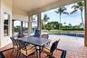 Covered outdoor patio with a paved surface