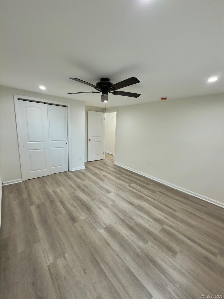 Spacious 1st bedroom with closet space.