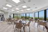 Indoor poolside seating provides a gathering space beside Tiara's outdoor amenities.