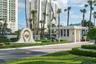 The gated Tiara entrance provides a landscaped arrival along North Ocean Drive.