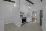 Eat in Kitchen with tile floors and beamed ceiling