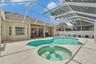 Pool/Spa with Screened Enclosure.