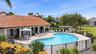 community lakehouse with pool