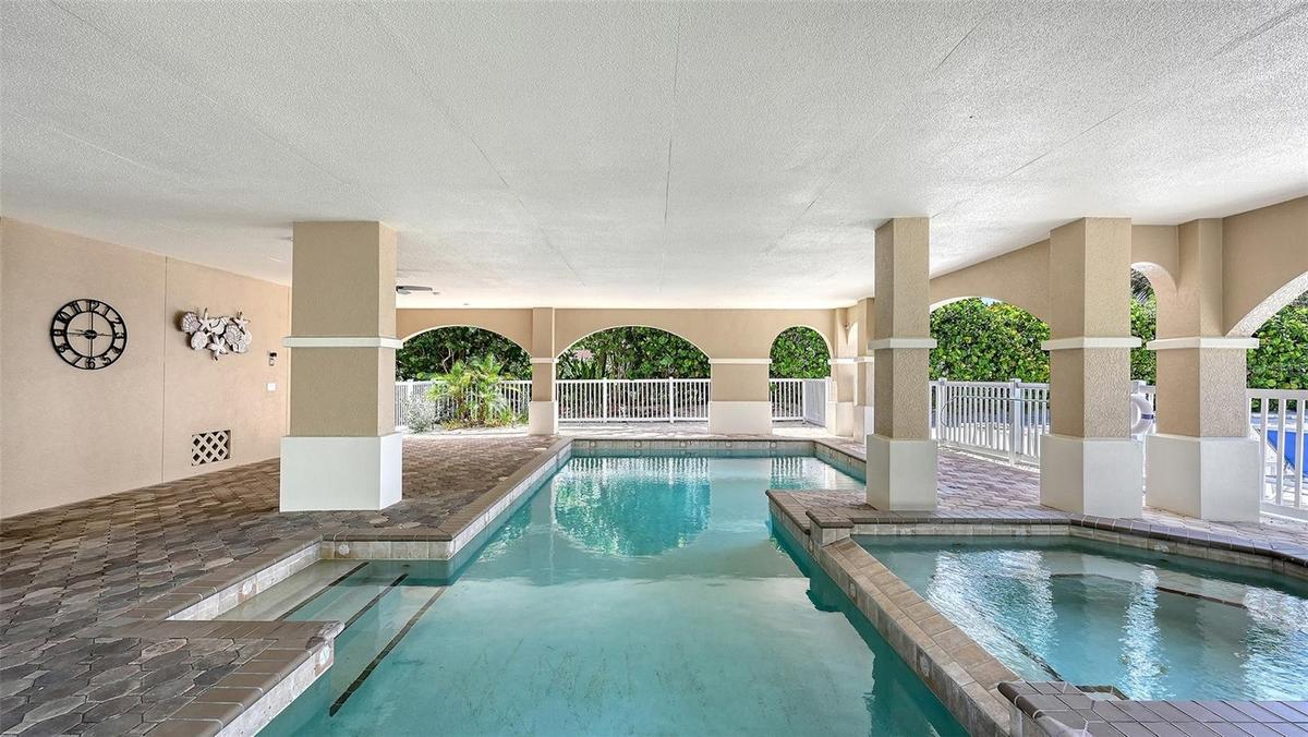 Daytime picture of heated pool and spa