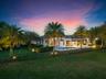 Spacious .5 acre lot with lake, golf and country club views