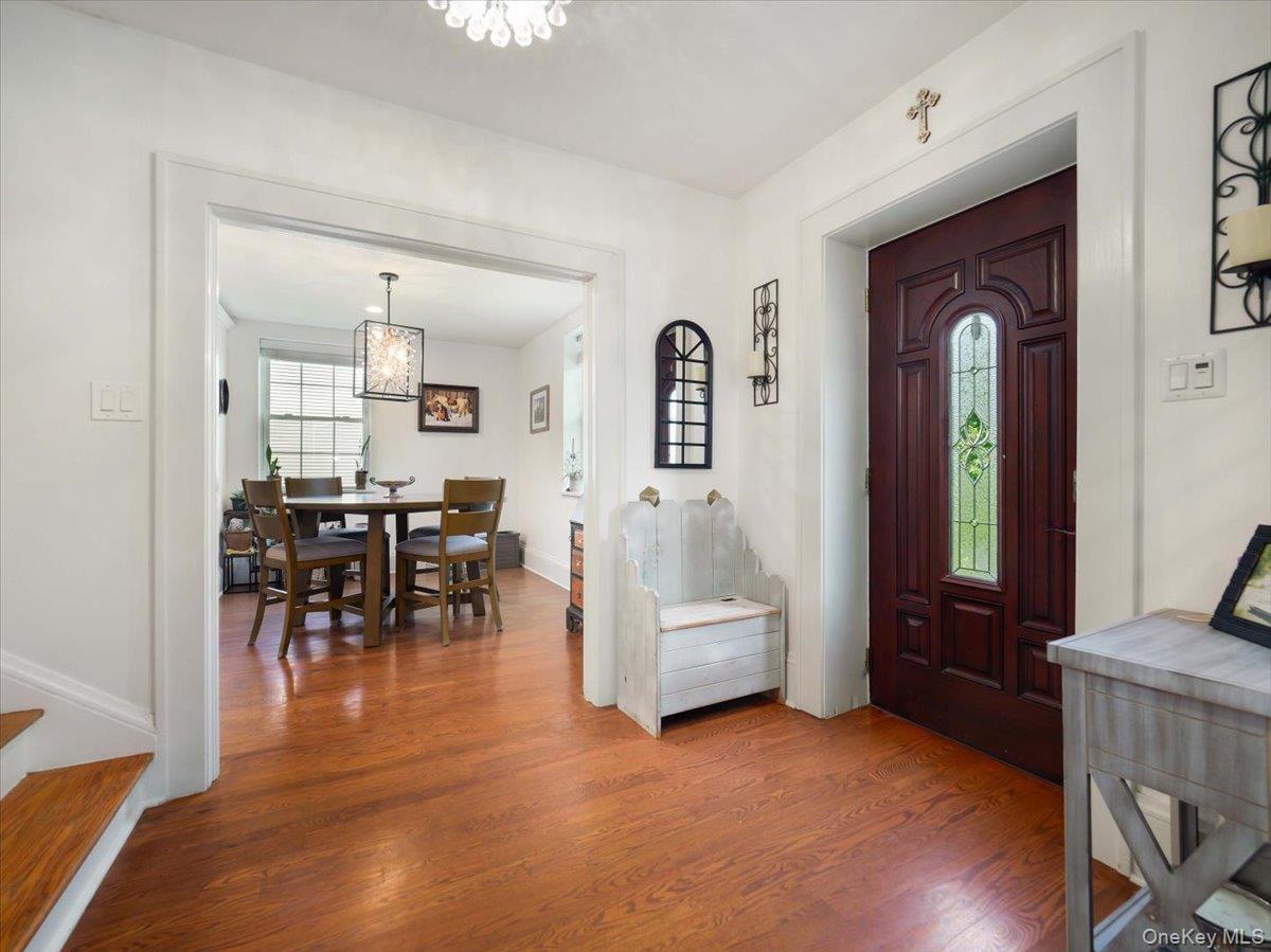 Front door entrance foyer to Living Room & Kitchen