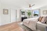 Spacious and waterfront primary bedroom with private entrance.