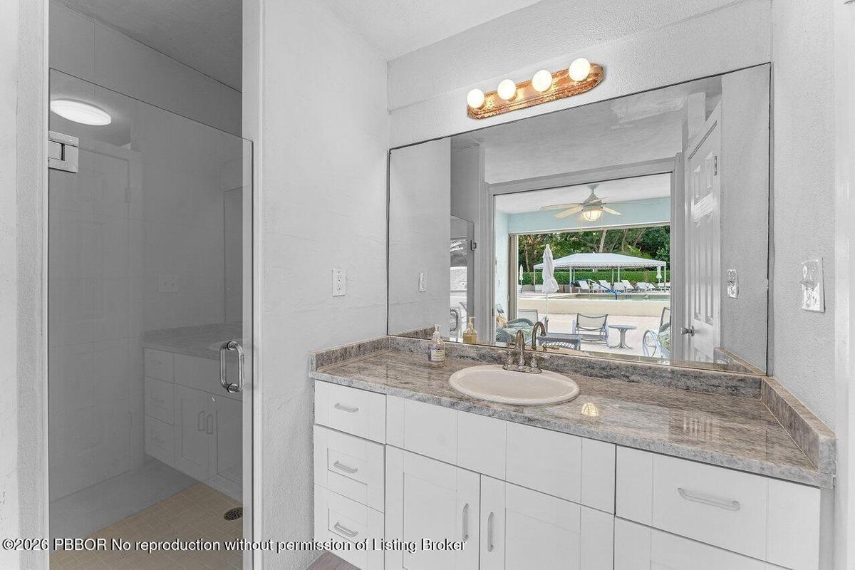 Cabana has a toilet, shower, sink. Add a tv and hang out by pool all day!