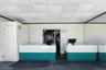 Reception featuring pet washing area and a paneled ceiling