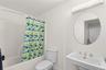 The third bedroom’s private ensuite bath offers comfort and convenience for all