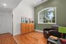 Thoughtfully situated between the second-level bedrooms, this light infused inviting open space features pinewood floors and a vaulted ceiling, creati