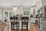 Full Kitchen with Bar Stools