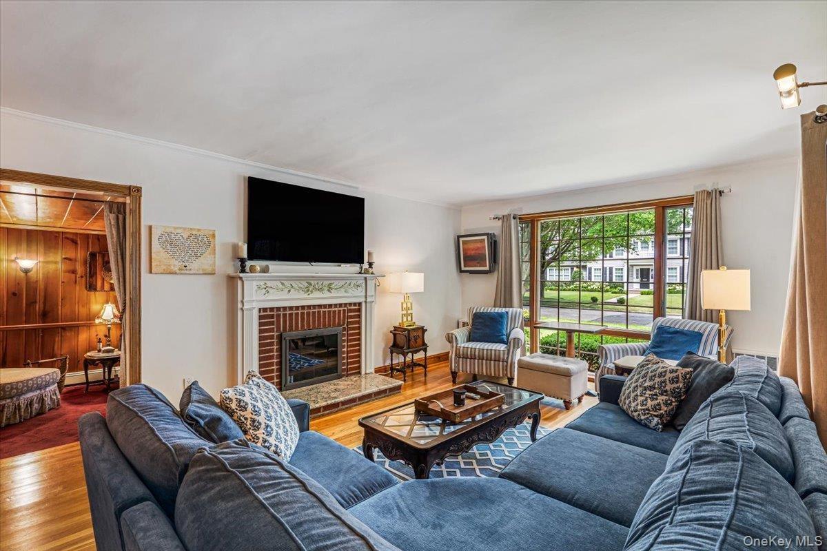 Living Room w/ Wood Burning Fireplace