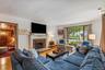 Living Room w/ Wood Burning Fireplace