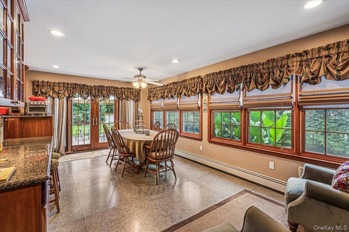 Large Eat-in  Area w/ Sliders to the Back Patio