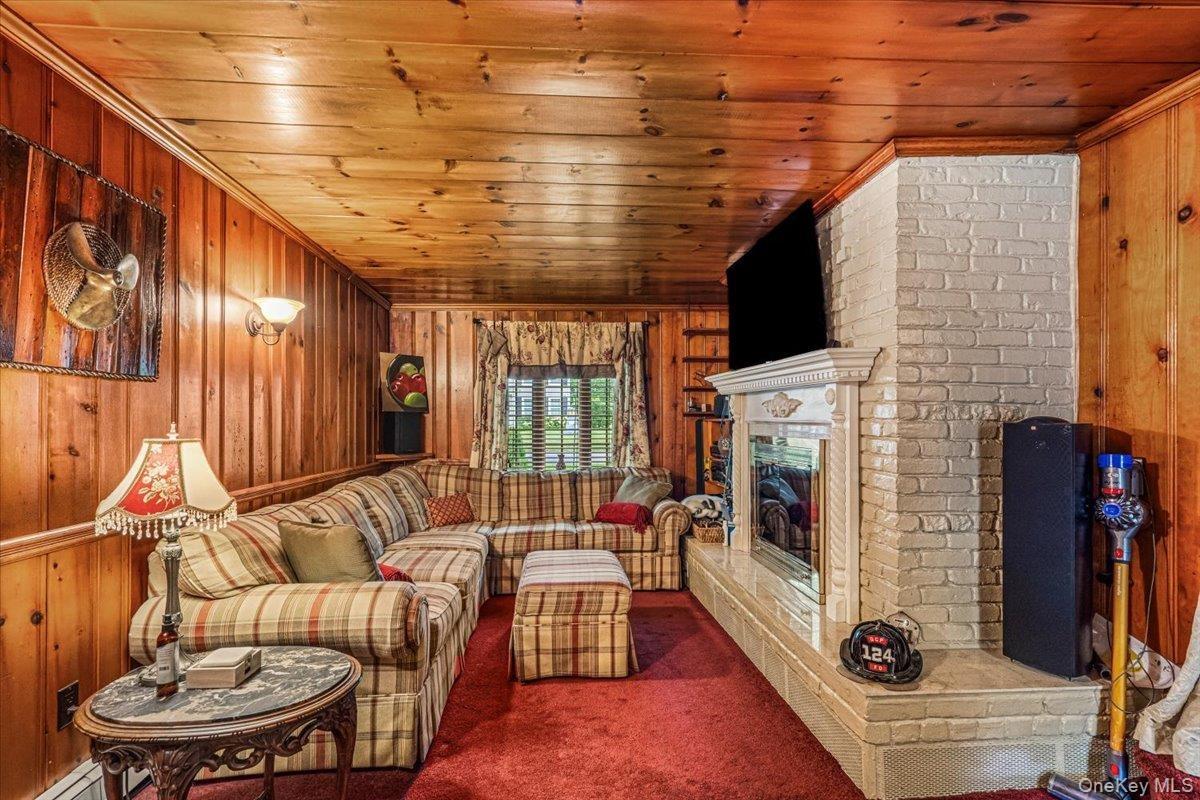 Den w/ Wood Burning Fireplace