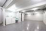 Finished basement featuring washer and dryer