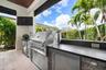 Propane Grill, Bar Fridge, and Ice Maker