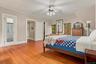 Primary bedroom with en suite full bathroom and private access