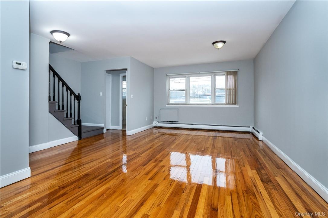 Vacant view of living room with steps upto bedrooms