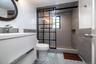 Brand new bathroom wtih walk in shower and glass door