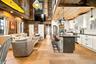 Vaulted wood-paneled ceiling with exposed beams