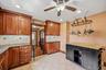Spacious kitchen offering ample cabinet storage and generous counter space.