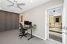 Exterior Door with Storm Door and Sidewalk Access.