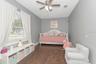 Bedroom #2 with LVP Flooring; Ceiling Fan; Extended Built-In Closet