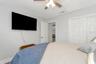 Bedroom #4 with LVP Flooring; Ceiling Fan; Extended Built-In Closet and adjacent to Full Bathroom