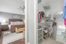 View of Walk-In Closet in Primary Bedroom