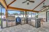 Summer Kithen with full stainless appliances, refrigerator, grill, etc.