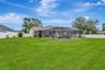 View of Back of Home, Side Yards, Fully Fenced, Pool and Pool Cage
