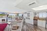 Kitchen and dining area positioned to take advantage of waterfront views.