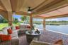 Covered waterfront seating area with wide-open water views.