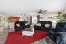 Main living room with open-concept layout and coastal décor.