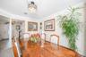 Recessed lighting, crown molding, and a chandelier with a ceiling medallion