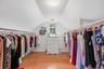 Enjoy the storage this massive walk-in closet provides!