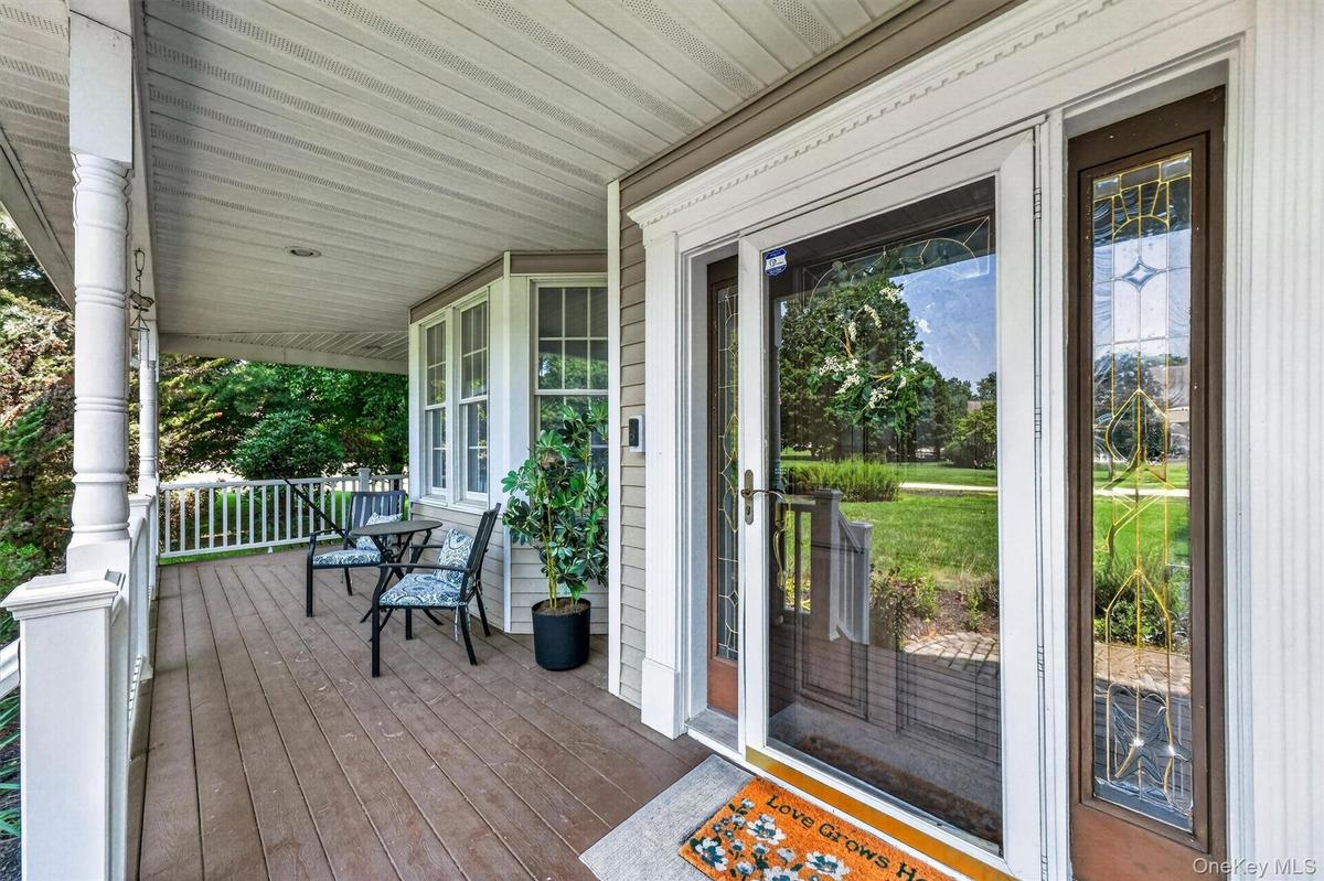 A charming wraparound rocking-chair porch provides the perfect spot to relax and unwind.