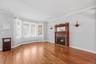 The living room offers plenty of light and a charming gas fireplace.