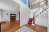 The foyer flows seamlessly into a large living room.