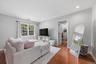 The primary bedroom is large enough for a separate lounging area.