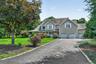 Plenty of parking is available with a 3-car garage and an expansive driveway.