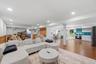 This basement offers a long list of conveniences for overnight guests or live-in childcare.