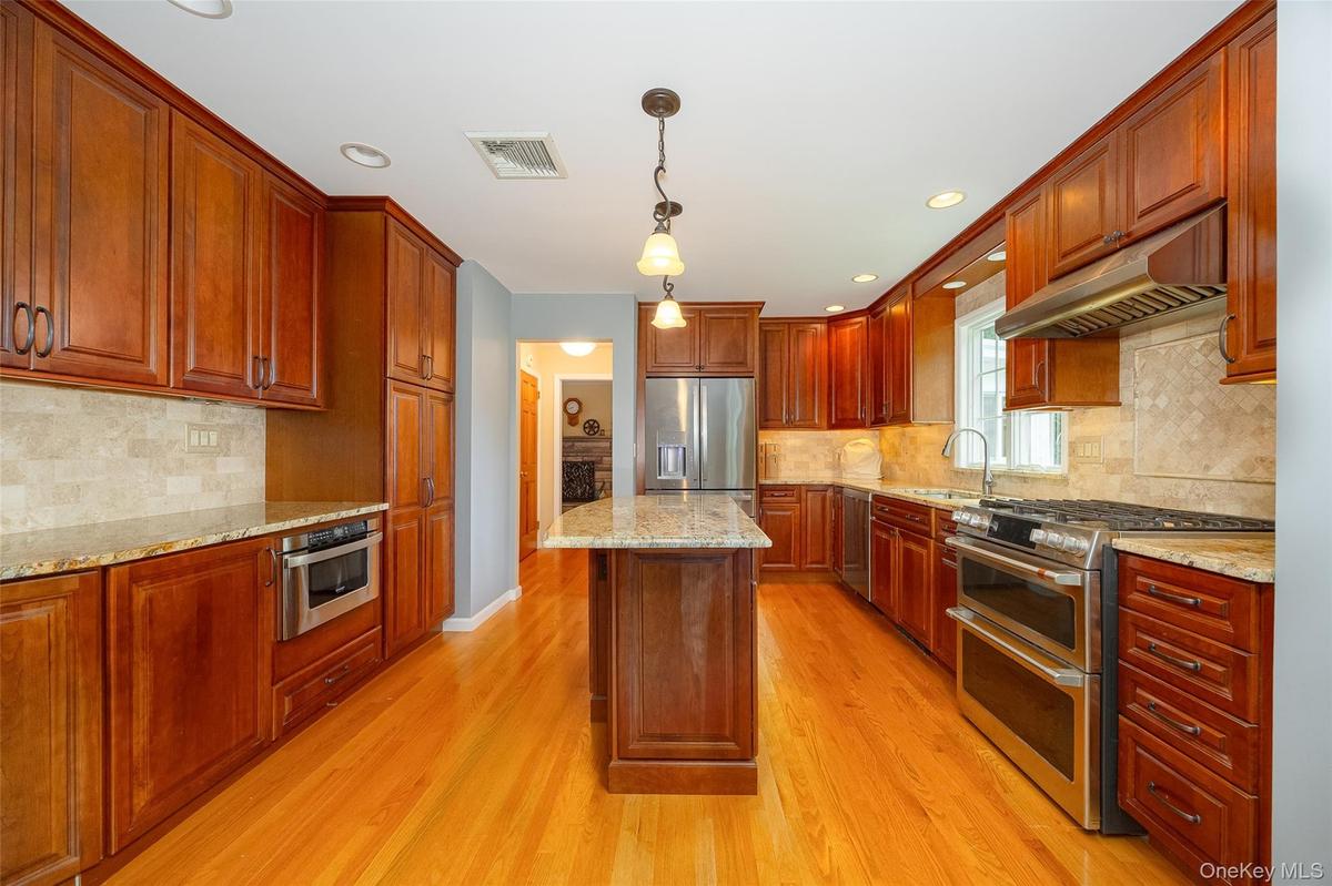 Chef's Kitchen with Granite Center Island