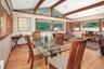 View of the dining area open to sitting area/den.