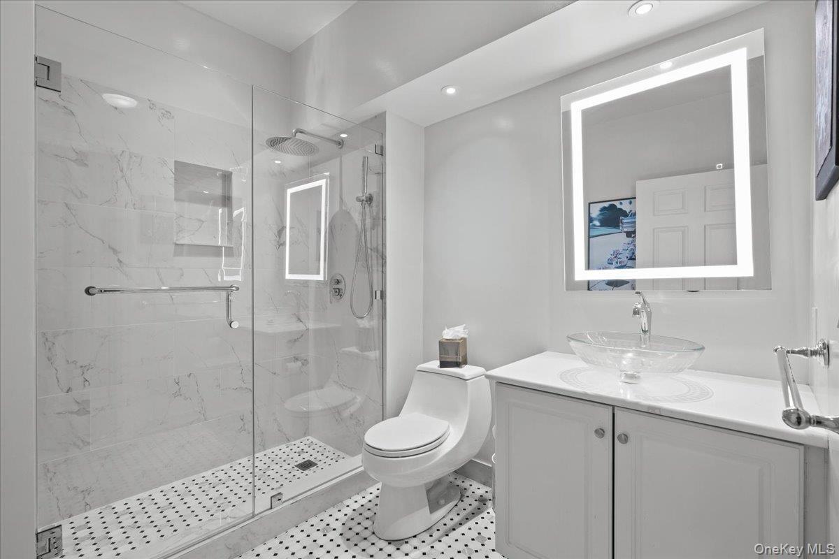 This is the bathroom attached to the second bedroom.