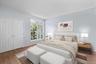 This room can serve as a bedroom, office or den. What ever your lifestyle needs this property can accommodate. Furniture virtually staged.